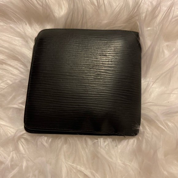 Louis  Vuitton Tiaga bi fold - Picture 2 of 6